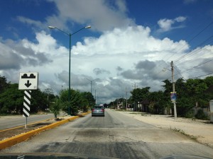 This is one of the highways. This is the only warning of the massive speed bump that is right there! You may not notice the hump... it would clean the bottom of your car right off!